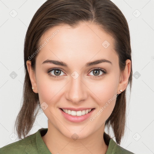 Joyful white young-adult female with medium  brown hair and brown eyes