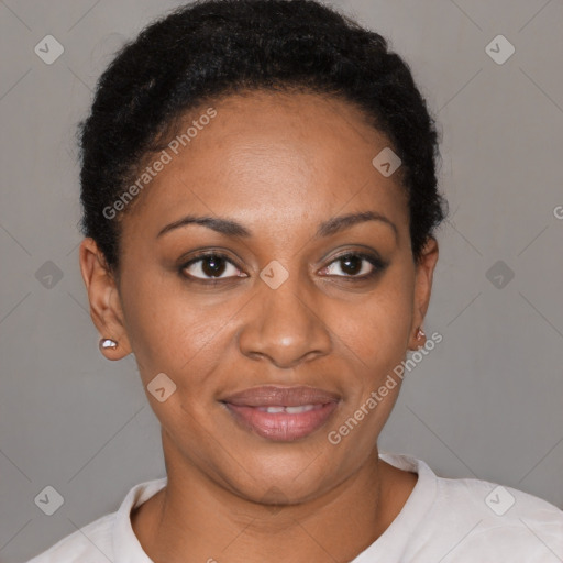 Joyful black young-adult female with short  brown hair and brown eyes