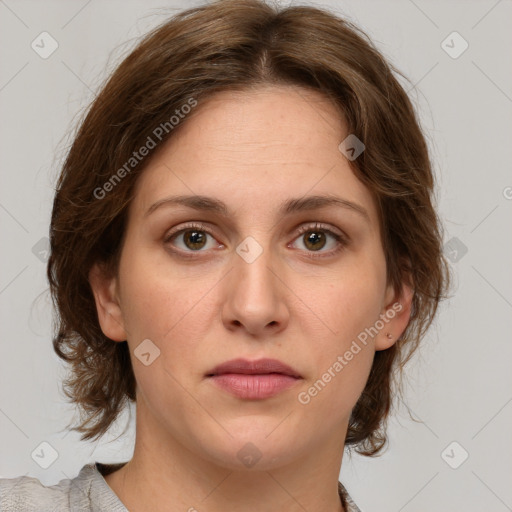 Joyful white young-adult female with medium  brown hair and green eyes