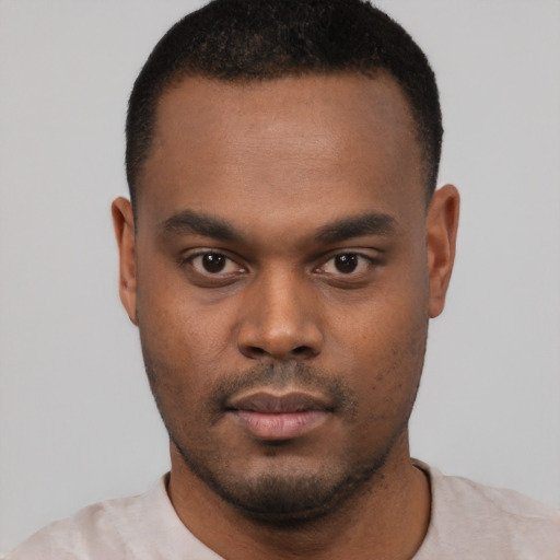 Neutral black young-adult male with short  black hair and brown eyes