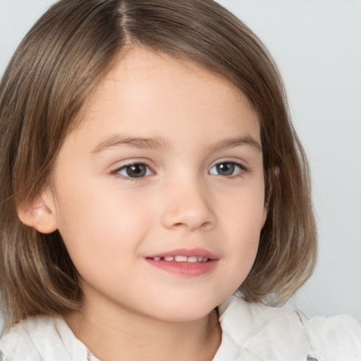 Joyful white child female with medium  brown hair and brown eyes