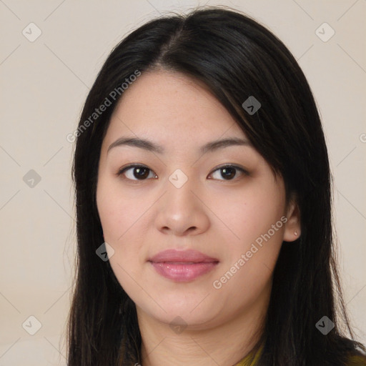 Joyful asian young-adult female with long  black hair and brown eyes