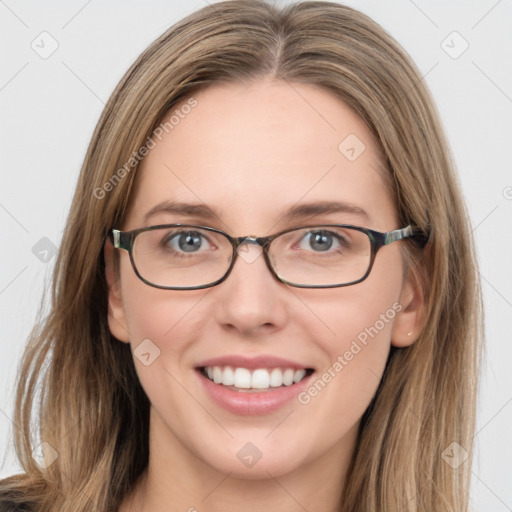 Joyful white young-adult female with long  brown hair and blue eyes