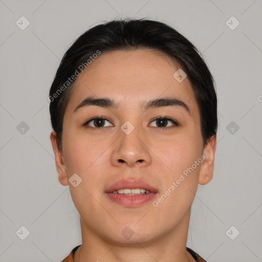 Joyful asian young-adult female with short  black hair and brown eyes