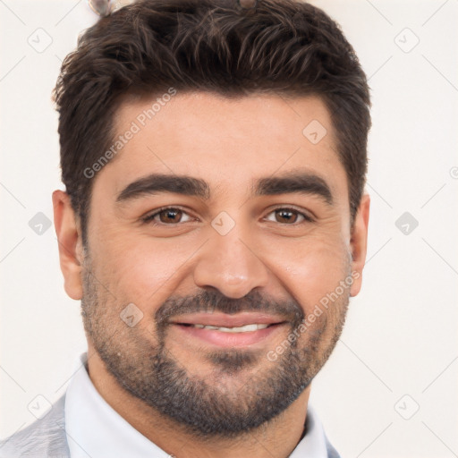 Joyful white young-adult male with short  black hair and brown eyes