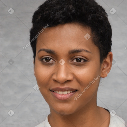 Joyful black young-adult female with short  black hair and brown eyes