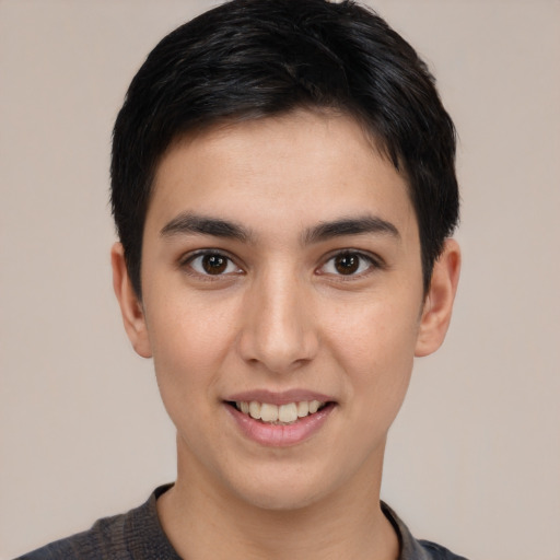 Joyful white young-adult male with short  black hair and brown eyes