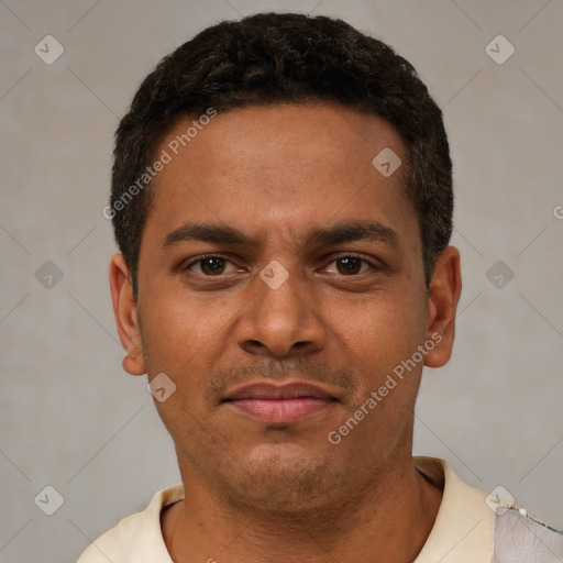 Joyful latino young-adult male with short  brown hair and brown eyes