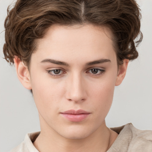 Neutral white young-adult female with short  brown hair and brown eyes