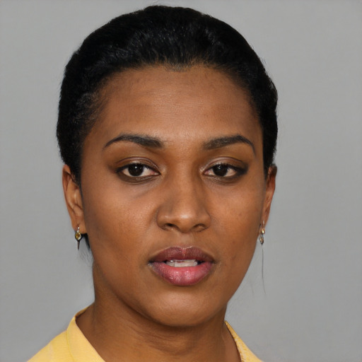 Neutral black young-adult female with short  black hair and brown eyes