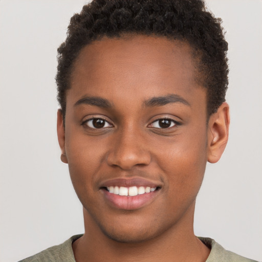 Joyful black young-adult male with short  brown hair and brown eyes