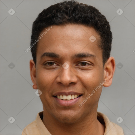 Joyful latino young-adult male with short  brown hair and brown eyes