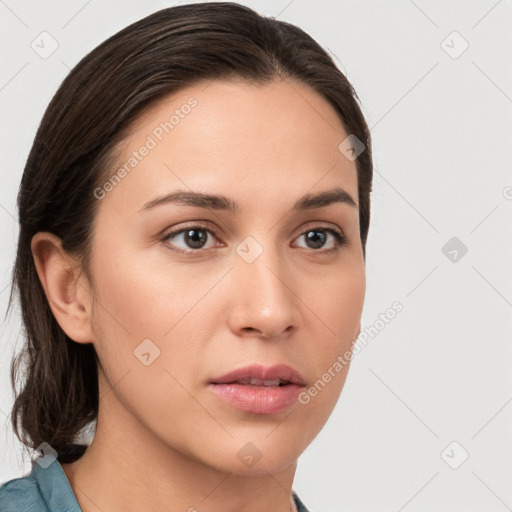 Neutral white young-adult female with medium  brown hair and brown eyes