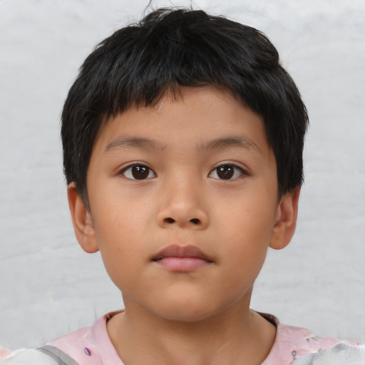 Neutral asian child male with short  brown hair and brown eyes