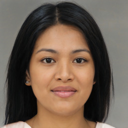 Joyful asian young-adult female with medium  black hair and brown eyes