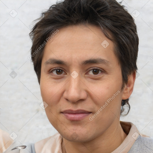 Joyful white adult female with short  brown hair and brown eyes