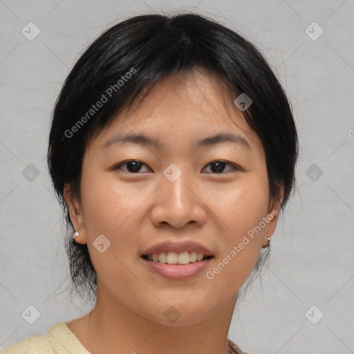 Joyful asian young-adult female with medium  brown hair and brown eyes