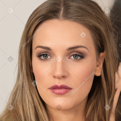 Neutral white young-adult female with long  brown hair and brown eyes