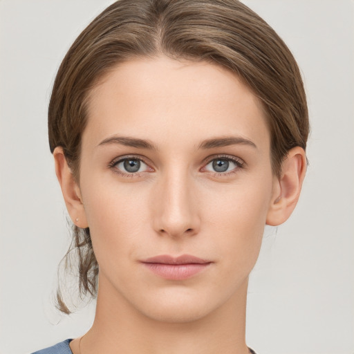 Neutral white young-adult female with medium  brown hair and grey eyes