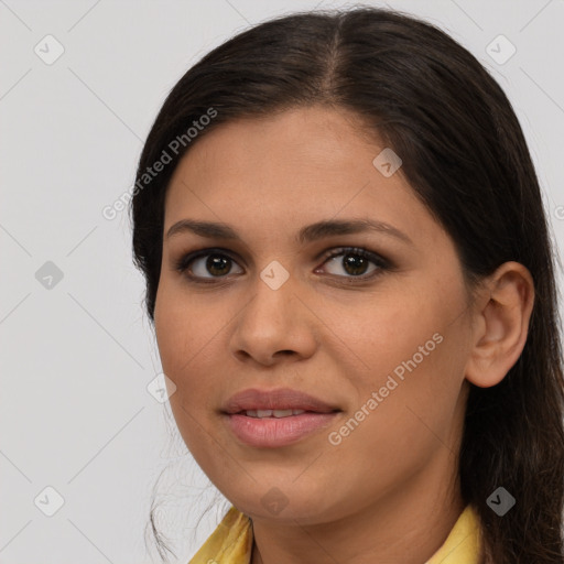 Joyful white young-adult female with long  brown hair and brown eyes