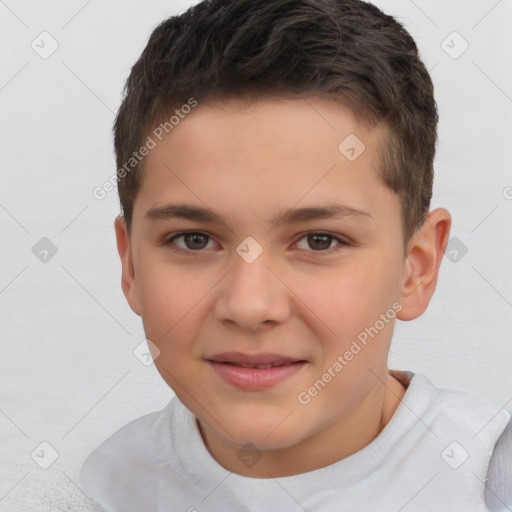 Joyful white child male with short  brown hair and brown eyes