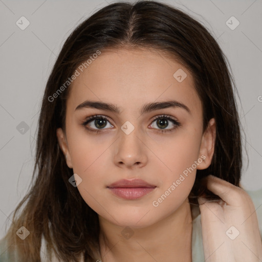 Neutral white young-adult female with long  brown hair and brown eyes