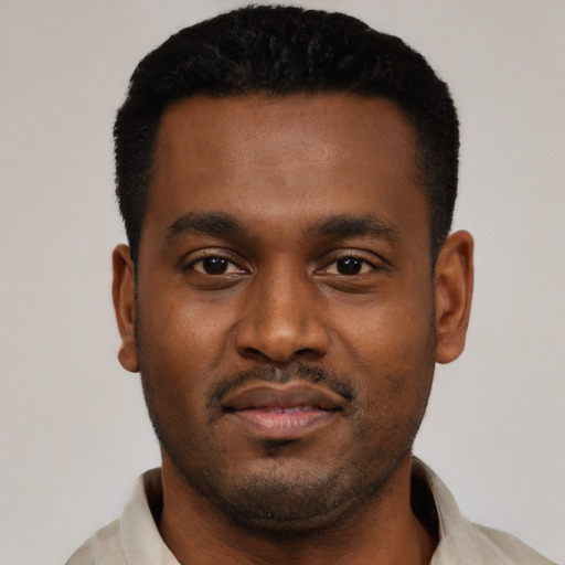Neutral black young-adult male with short  black hair and brown eyes