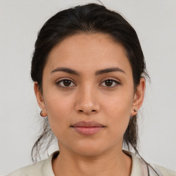 Neutral asian young-adult female with medium  brown hair and brown eyes