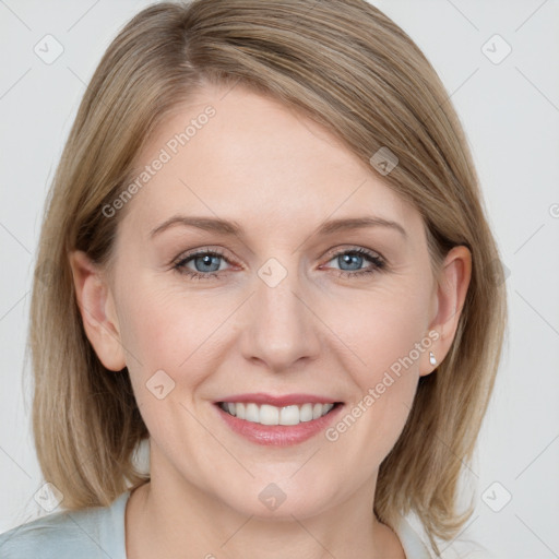 Joyful white young-adult female with medium  brown hair and blue eyes