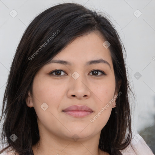 Joyful asian young-adult female with long  brown hair and brown eyes