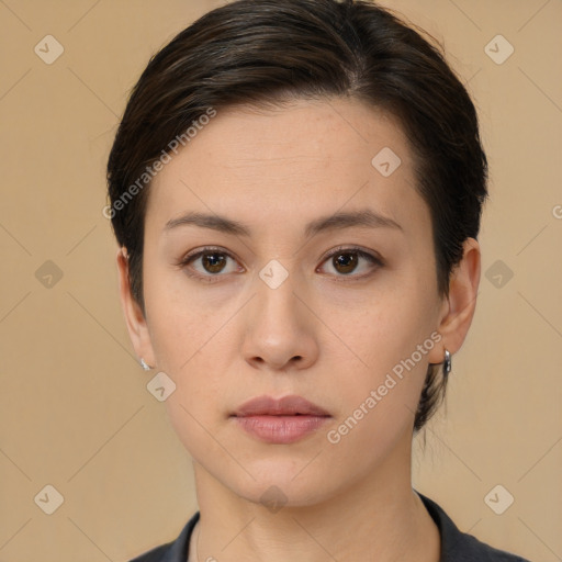 Neutral white young-adult female with short  brown hair and brown eyes