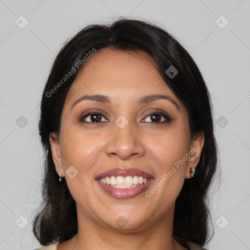 Joyful latino young-adult female with medium  black hair and brown eyes