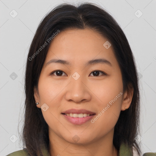 Joyful asian young-adult female with medium  brown hair and brown eyes