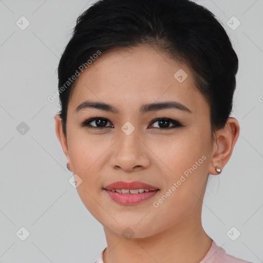 Joyful asian young-adult female with short  brown hair and brown eyes