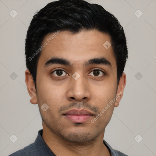 Neutral latino young-adult male with short  black hair and brown eyes