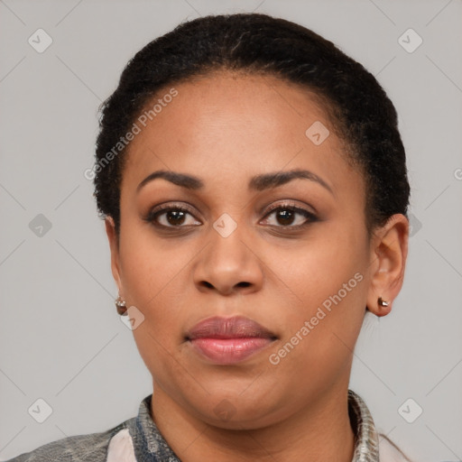 Joyful latino young-adult female with short  brown hair and brown eyes