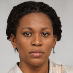 Neutral black young-adult female with short  brown hair and brown eyes