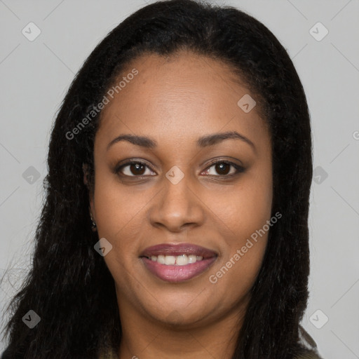 Joyful latino young-adult female with long  brown hair and brown eyes