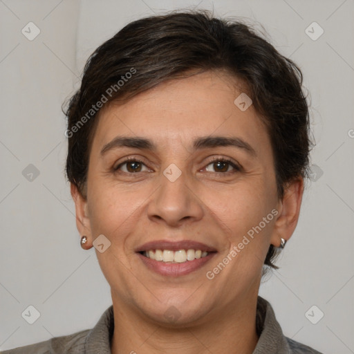 Joyful white adult female with short  brown hair and brown eyes