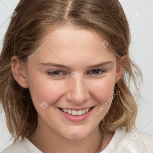 Joyful white child female with medium  brown hair and brown eyes