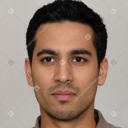 Neutral latino young-adult male with short  black hair and brown eyes