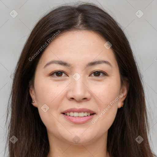 Joyful white young-adult female with long  brown hair and brown eyes