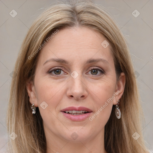 Joyful white adult female with medium  brown hair and grey eyes