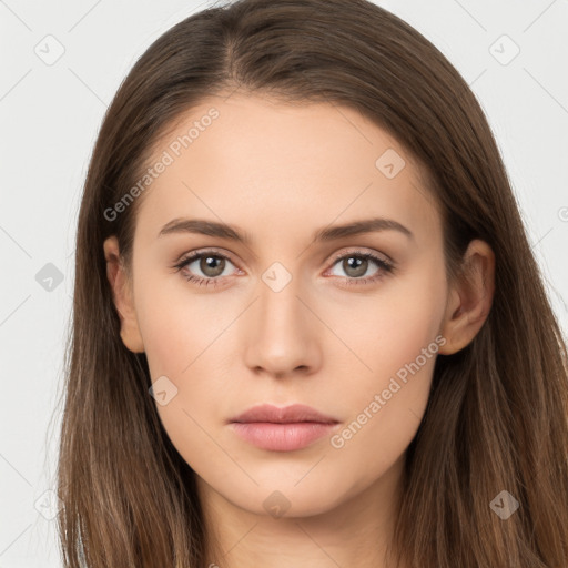 Neutral white young-adult female with long  brown hair and brown eyes