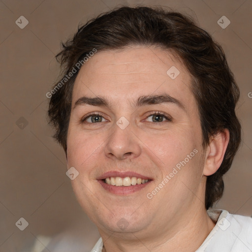 Joyful white adult male with medium  brown hair and brown eyes