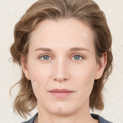 Joyful white young-adult female with medium  brown hair and blue eyes