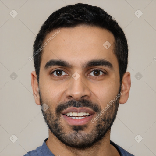 Joyful latino young-adult male with short  black hair and brown eyes