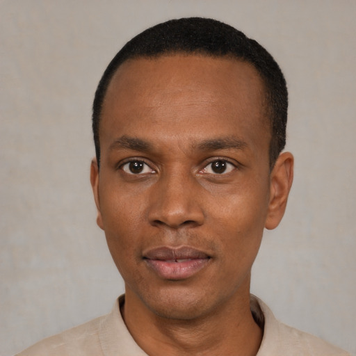 Neutral black young-adult male with short  black hair and brown eyes