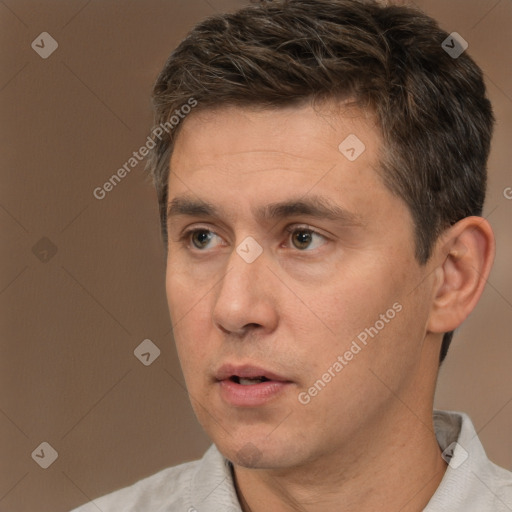 Neutral white adult male with short  brown hair and brown eyes