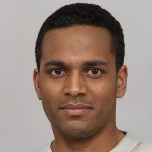 Neutral black young-adult male with short  black hair and brown eyes